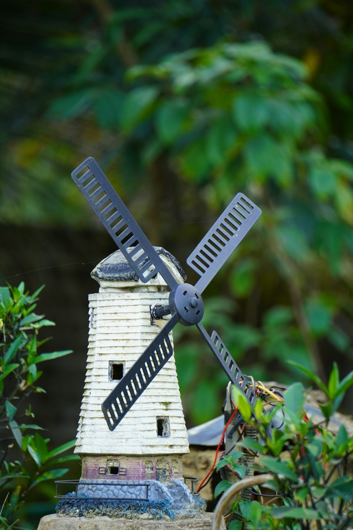 a windmill made out of a piece of metal