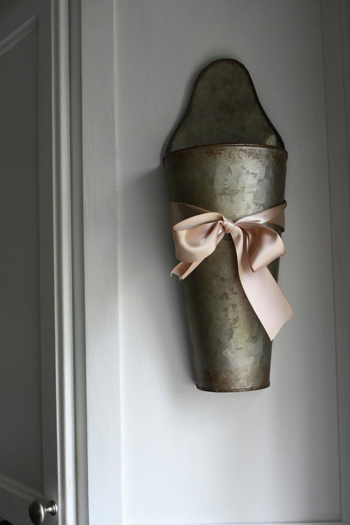 a metal object with a bow